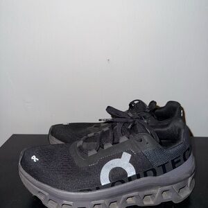 On cloud Running monster all black.